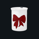 Red Bow Pitcher<br><div class="desc">Complement your dining room or kitchen and freshen up your table's look with this decorative and functional pitcher. An elegant way to serve water, milk, juice or iced tea at any meal or use it to hold utensils, brushes, or a bouquet on the table. Ideal for both indoor and outdoor...</div>