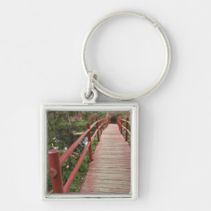 Red bridge over pond, Magnolia Plantation, Keychain
