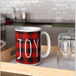 Red Buffalo Plaid & Joy | Happy Holiday Coffee Mug<br><div class="desc">Bring a cozy lodge-style charm to your holiday décor with this personalized red and black buffalo plaid throw pillow. Featuring a bold white deer silhouette and your family name in elegant lettering, it creates a perfect festive focal point for sofas, guest rooms, or cabin settings. Surrounded by classic Christmas favorites...</div>