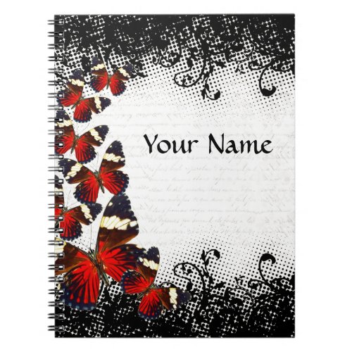 Red butterflies on black lace notebook