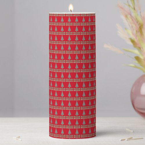 red candle with bows and bells for christmas