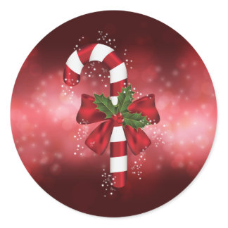 Red Candy Cane On A Red Bokeh Background Classic Round Sticker