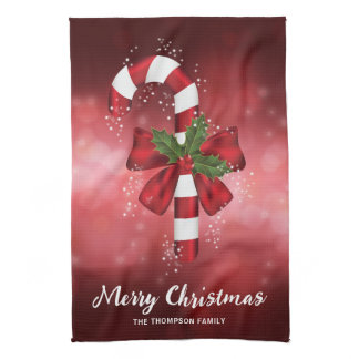 Red Candy Cane On A Red Bokeh Background Kitchen Towel