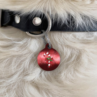 Red Candy Cane On A Red Bokeh Background Pet ID Tag
