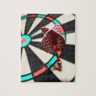 Red checkered dart on dartboard jigsaw puzzle