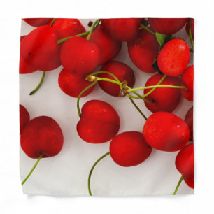 Red Cherries in Natural Light Lay on White Bandana