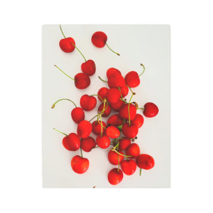 Red Cherries in Natural Light Lay on White Metal Print