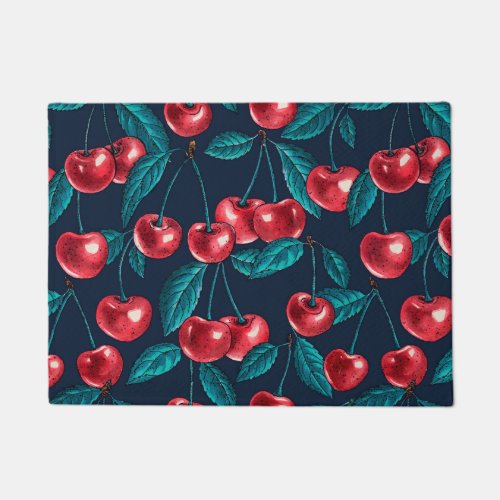 Red cherries on dark blue doormat