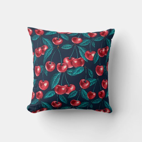 Red cherries on dark blue throw pillow