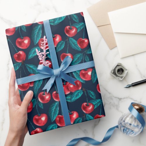 Red cherries on dark blue wrapping paper
