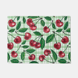 Red cherries on light green gingham doormat