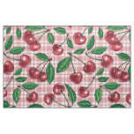 Red cherries on pink gingham fabric