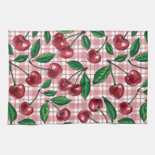 Red cherries on pink gingham kitchen towel