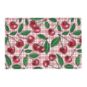 Red cherries on pink gingham placemat
