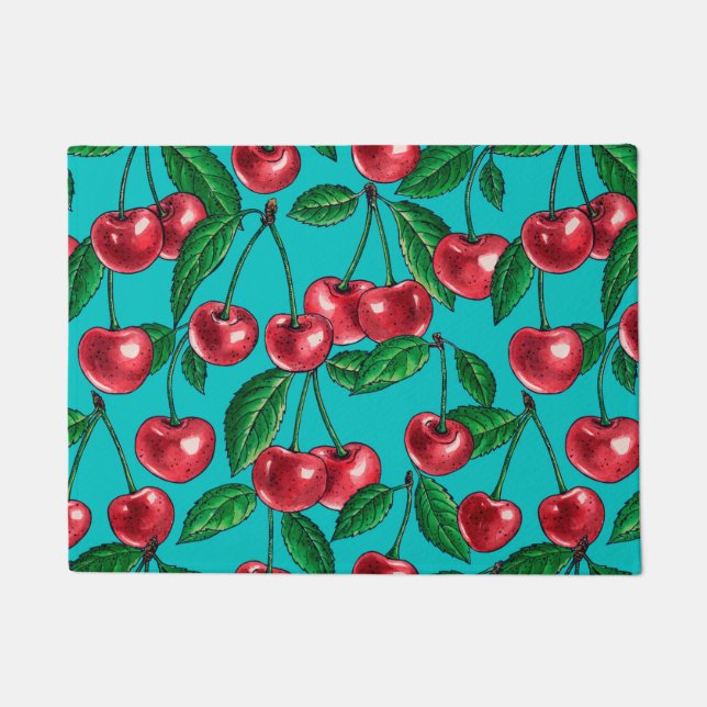 Red cherries on turquoise doormat (Front)
