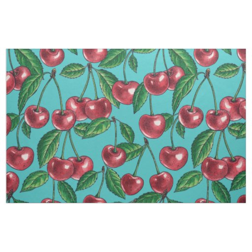 Red cherries on turquoise fabric