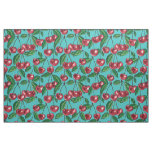 Red cherries on turquoise fabric