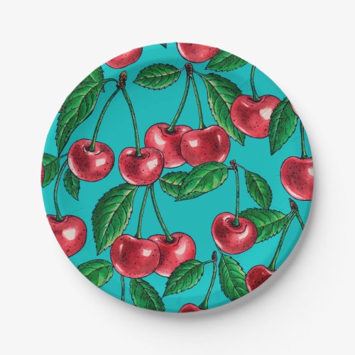 Red cherries on turquoise paper plates
