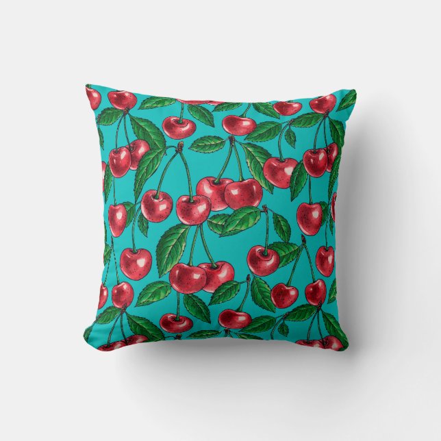 Red cherries on turquoise throw pillow (Front)