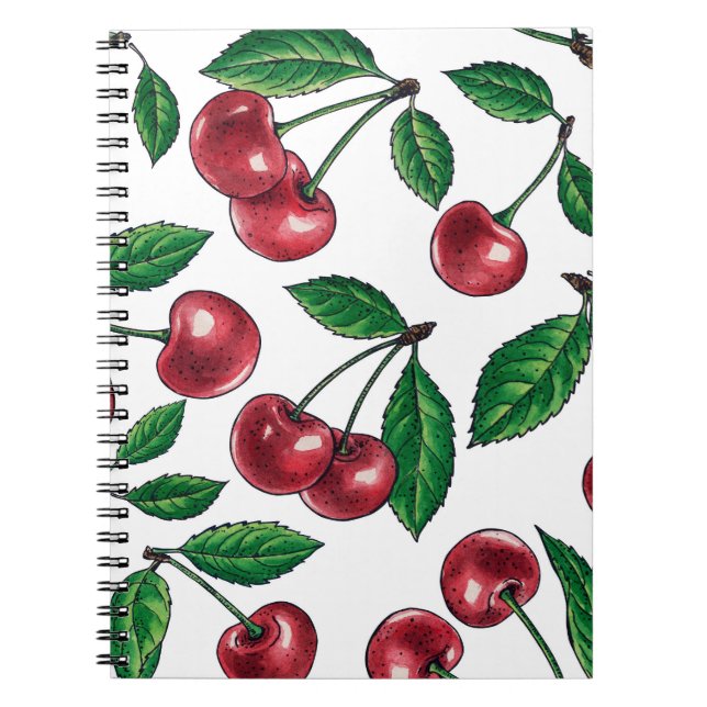 Red cherries on white notebook (Front)