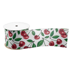 Red cherries on white satin ribbon