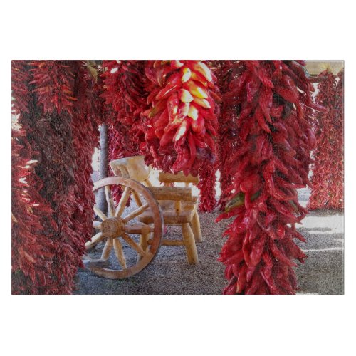 Red Chile Pepper Ristra on glass cutting board