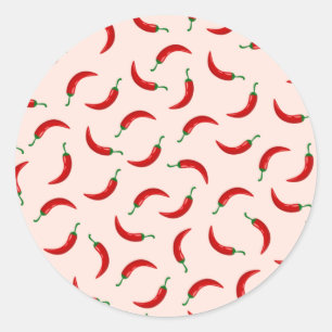 Red chili peppers on light coloured background classic round sticker