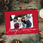 Red Christmas Calligraphy Script Simple Photo Holiday Card<br><div class="desc">Red Christmas Calligraphy Script Simple 3 Photo Holiday Card features a modern calligraphy greeting over a horizontal photo.</div>