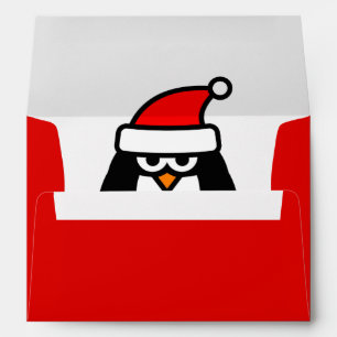 Red Christmas envelopes with funny Santa penguin