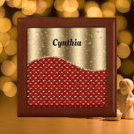 Red Christmas Floral with Gold Ribbon and Name Gift Box<br><div class="desc">This personalized design includes your or your recipient's name in black against a gold-colored ribbon at the top. Make sure to type the Name in the Personalize section. This lovely design - with star-shaped poinsettias on red topped by gold-colored curvy ribbon - is an elegant way to celebrate. The colors...</div>