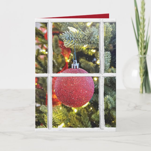 red Christmas ornament in snowy window Holiday Card (Front)