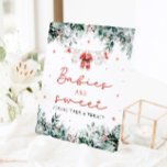 Red Christmas Santa Babies Are Sweet Take a Treat Pedestal Sign<br><div class="desc">The Red Santa Gender Neutral Santa Baby Clothes Christmas Babies Are Sweet Sign brings an adorable, festive touch to your holiday baby shower! Featuring a vibrant red design with snowflakes, seasonal eucalyptus greenery, and charming Santa-inspired baby clothes, this sign is perfect for decorating your dessert or sweets table. It warmly...</div>