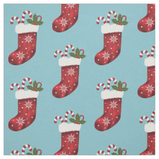 Red Christmas Stocking With Candy Canes On Blue Fabric