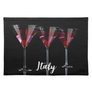 Red cocktails in martini glass with cherry cloth placemat