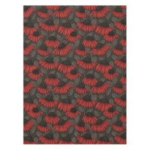 Red coneflowers on brown tablecloth