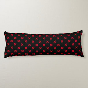 Red cross stitches on black body pillow