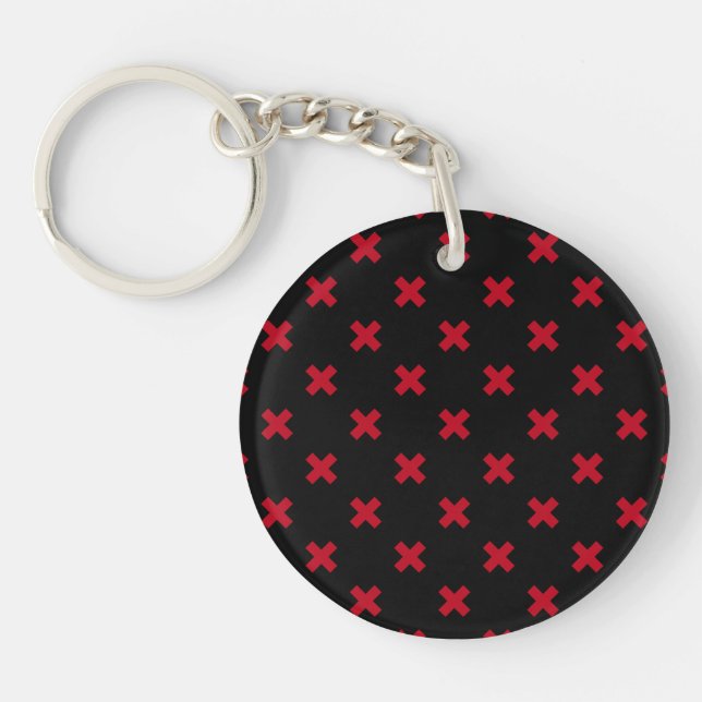 Red cross stitches on black keychain (Front)