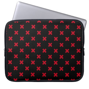 Red cross stitches on black laptop sleeve