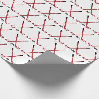 Red Crossed Hockey Sticks and Puck Wrapping Paper