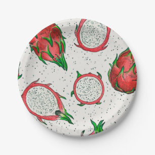 Red dragon fruit on off white paper plates