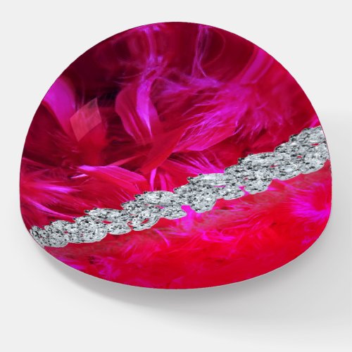 Red feather boa and diamond paperweight