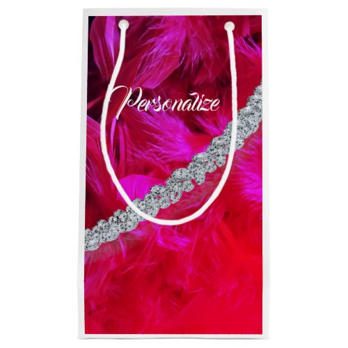 Red feather boa draped with diamonds gift bag