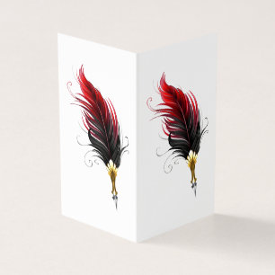 Red feather pen with gold nib