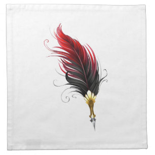 Red feather pen with gold nib cloth napkin