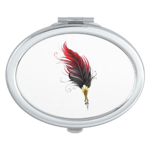 Red feather pen with gold nib compact mirror