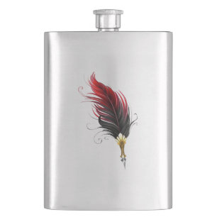 Red feather pen with gold nib flask