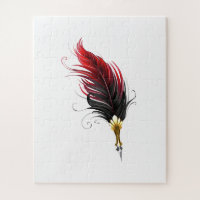 Red feather pen with gold nib