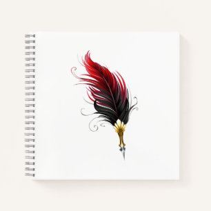 Red feather pen with gold nib notebook