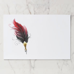 Red feather pen with gold nib paper pad
