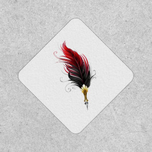 Red feather pen with gold nib patch
